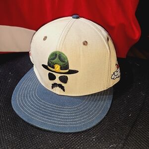 Beige and Blue Cap with Artistic Design